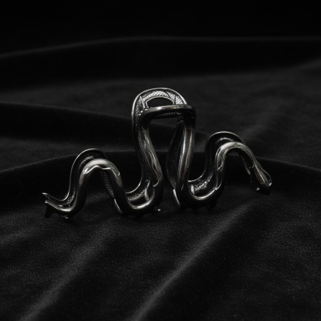 Gunmetal serpent claw clip on black velvet