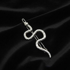 Silver snake hair clip centered black velvet